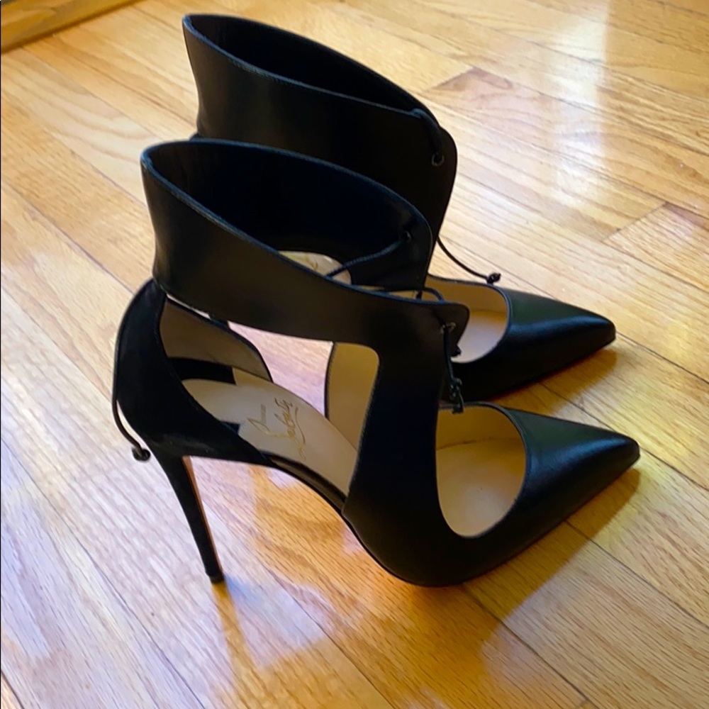 New Louboutin shoes. NEVER WORN!